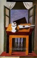 開いた窓の前のテーブル上の静物画 1919 年キュビスト パブロ・ピカソ